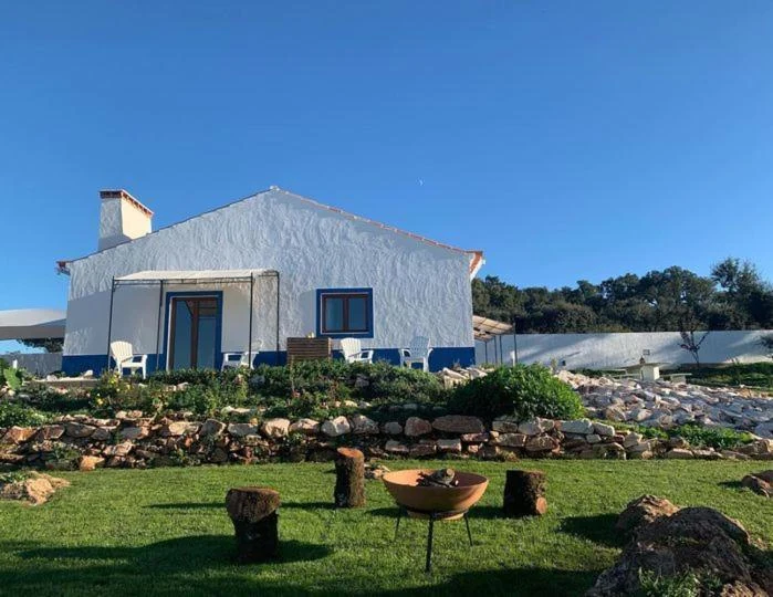 Gardens and whitewashed accommodation on the Maridona estate